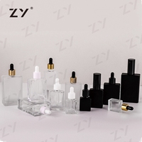 Vente en gros de flacons compte-gouttes plats en bambou inhabituels de 30ml 70ml 50ml 2oz pour crème pour le visage à l'huile capillaire avec manipulation de surface sérigraphique