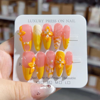 Fait à la main 10 pièces ABS matériel presse-sur faux ongles conception d'amande modèle à la mode personnalisé fleur sculpture doigts