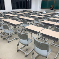 Conjunto de Escritorio y Silla Escolar Moderno, Cómodo y Duradero, Ajustable en Altura, con Marco Metálico, Superficie de Madera y Cesta para Libros, para Oficina en Casa