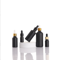 Flacon compte-gouttes en verre noir personnalisé avec bouchons en caoutchouc noir 5ml 10ml 15ml 20ml pour huiles essentielles, sérums et emballages cosmétiques