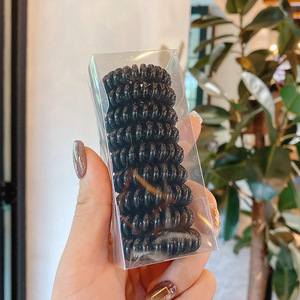 Accessoires pour bébés : Élastiques à cheveux en spirale, version coréenne, avec boules simples en plastique/résine - Product Image 1