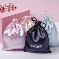 Luxe haute qualité cheveux soie cordon sacs Satin perruque cheveux sacs-cadeaux pochettes pour la fête d'anniversaire de faveur de mariage