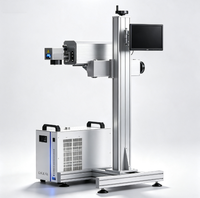 Machine de marquage laser CO2, imprimante laser automatique en ligne, fonctionnement facile pour le codage et l'impression des emballages alimentaires et des boîtes en carton ondulé