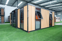 Maison conteneur en verre à double aile extensible, villa préfabriquée avec design personnalisé pour projets hôteliers et résidentiels