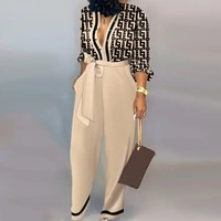 Combinaison élégante pour femme avec ceinture, imprimée et boutonnée, collection été 2026