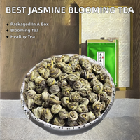 Thé vert au jasmin, thé aux fleurs écloseuses, emballage en boîte, spécialité santé