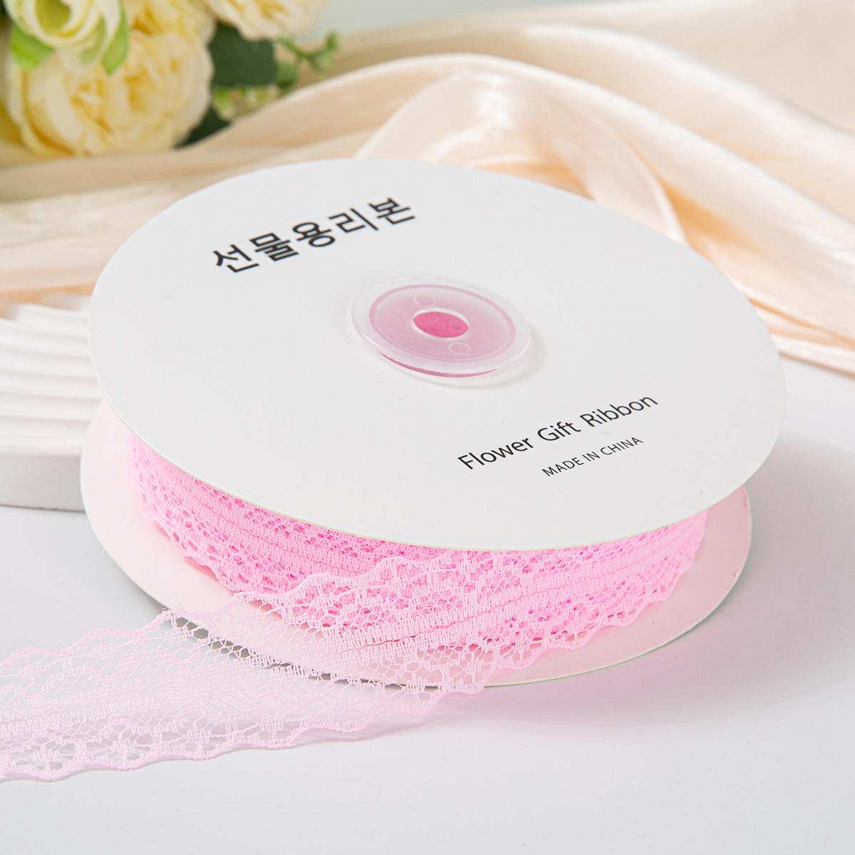 เข็มขัดลูกไม้สีชมพู 3 ซม. 50 หลา ประมาณ 45 ม