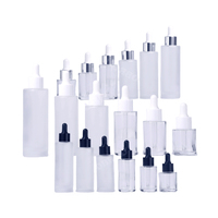 Botella de vidrio ámbar cilíndrica de hombro plano de gran venta, 20ml, 30ml, 60ml, con bomba dosificadora para loción/spray, impresión de superficie grabada con ácido