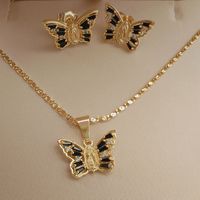 JML Nuevo y Hermoso Juego de Joyería de Lujo para Mujer con Aretes de Mariposa y Zirconia, Collar con Colgante de la Virgen María, Bañado en Oro de 14K para Fiestas y Bodas