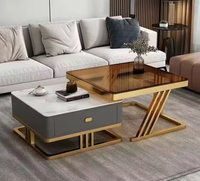 Table basse moderne de luxe avec plateau relevable en pierre frittée, tiroir de rangement et structure en métal noir pour salon