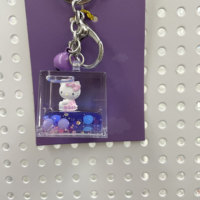 Porte-clés en acrylique personnalisable en gros, avec liquide flottant 3D, paillettes brillantes, motif de dessin animé imprimé par sérigraphie, tendance