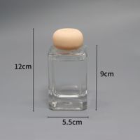 Nouvelle conception de diffuseur de roseau d'aromathérapie rond en verre transparent bouteille de parfum en verre diffuseur de roseau à capuchon en gypse avec logo personnalisé