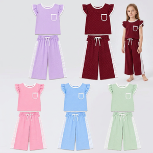 Vente en gros de hauts à manches volantées à pois pour fillettes avec poche et pantalon large, ensembles de 2 pièces, vêtements décontractés pour enfants - Product Image 1