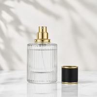 Flacon de parfum en verre de luxe de forme ronde avec pulvérisateur doré et bouchon à vis 30ml/50ml, atomiseur de parfum vide pour emballage cosmétique