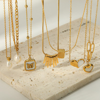 Collier à pendentif en forme de cœur en perles de coquillage à double couche plaqué or 18 carats en acier inoxydable INS à la mode, vente chaude, sans ternissement, pour femmes