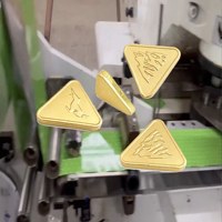 Équipement d'emballage triangulaire de bonbons en feuille d'aluminium haute efficacité, personnalisable et automatique