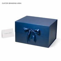 Boîte cadeau imperméable bleu foncé avec doublure en éponge, nœud en ruban sur le devant, structure pliable pour les marques de détail et les cadeaux saisonniers