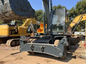 Excavatrice sur pneus Hyundai 210W-9 d'occasion de haute qualité, moteur Cummins, modèle 2015, capacité de la cuve de 1,3 m, composants principaux inclus - Product Image 4