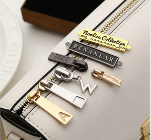 <span class=keywords><strong>Fermeture</strong></span> <span class=keywords><strong>éclair</strong></span> en alliage de zinc de haute qualité, imperméable et dorée # 5 tirettes personnalisées en métal avec logo pour vestes et sacs - Product Image 1