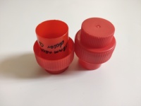 Capuchon doseur en plastique de 38mm pour col de préforme orange de 38mm