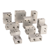 Bloc de soupapes hydrauliques en aluminium usiné CNC sur mesure avec trous de montage filetés pour machines industrielles OEM