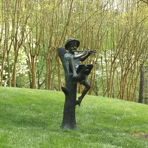 Factory custom Child reading statue outdoor garden decoration sitting boy played the flute in the tree sculpture