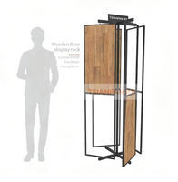 Présentoir de sol rotatif multi-panneaux en bois avec structure métallique noire minimaliste et cadre oscillant pour échantillons de grandes planches de bois