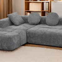 Canapé d'angle en tissu blanc haute densité rembourré en éponge, personnalisé en usine, pour salon, canapé noir pour usage hôtelier