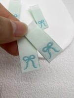Noeud petite étiquette latérale tissu fait à la main demi pli étiquette couture bricolage accessoires tissage étiquette