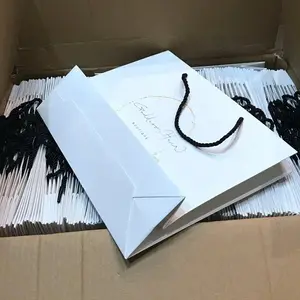 hair packaging bags Customize design white thick plain kraft machine printing fancy shopping packaging paper bags