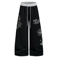 Jogging décontracté style rétro américain avec imprimé lettres vieillies pour hommes et femmes – Pantalon de sport ample à jambe large et coupe droite