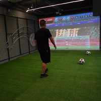 Simulateur de tir de football en salle Simulateur de football interactif et lanceur de balles Simulateur d'entraînement de football