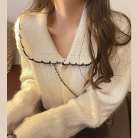 Femmes automne/hiver doux poupée col Style japonais Cardigan manteau nouvelle couleur unie lâche paresseux vent tricoté pull OEM Service