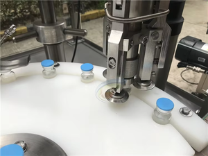 Machine de remplissage, bouchage et capsulage automatique de flacons en verre pour produits chimiques et boissons, haute précision, 2-200 ml, motorisée par PLC, pour petites bouteilles - Product Image 3