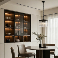 Petit luminaire suspendu en cristal en forme de tambour, chaîne en métal noir pour la décoration de salle à manger
