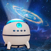 Nouvelle lumière de projection d'étoiles Creative Space Capsule Lumière de nuit d'ambiance laser rvb Source d'alimentation USB Commutateur de capteur ABS