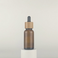 Flacon compte-gouttes en verre de 30 ml, flacon compte-gouttes résistant aux enfants de 1 oz, flacon d'huile essentielle bleu ambre avec compte-gouttes en bambou pour huile corporelle
