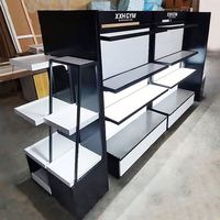Estantes de Exhibición Modernos y Ecológicos Personalizados para Tiendas de Cosméticos, Maquillaje y Cuidado de la Piel, Mostrador Pequeño Negro con Luz LED