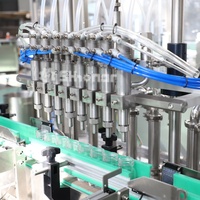 Machine de remplissage automatique de bouteilles de liquide par pulvérisation de haute précision 10 ml-50 ml pour ligne de remplissage de boissons, produits chimiques et sirops