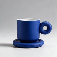 Ensemble de tasses en céramique bleu Klein mat de luxe en gros, tasse à café fantaisie avec anse en forme d'anneau et soucoupe pour la décoration intérieure et les cadeaux