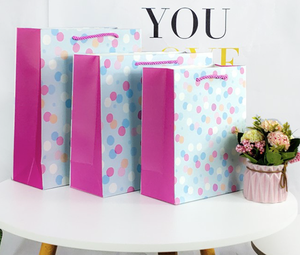 ถุงกระดาษสีขาวพิมพ์ลายตามสั่ง หรูหรา ทนทาน เป็นมิตรกับสิ่งแวดล้อม พับเก็บได้ ใช้ซ้ำได้ พร้อมหูหิ้วริบบิ้น - Product Image 6