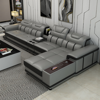 2023 Günstiges Wohnzimmer-Möbel Sofas Ecksofas L-förmige Leder-Sofa-Garnitur mit Anpassbarem Material und Funktionstisch