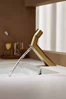 Robinet de lavabo moderne élégant et créatif en or brossé à un seul trou avec cartouche en céramique et eau chaude/froide