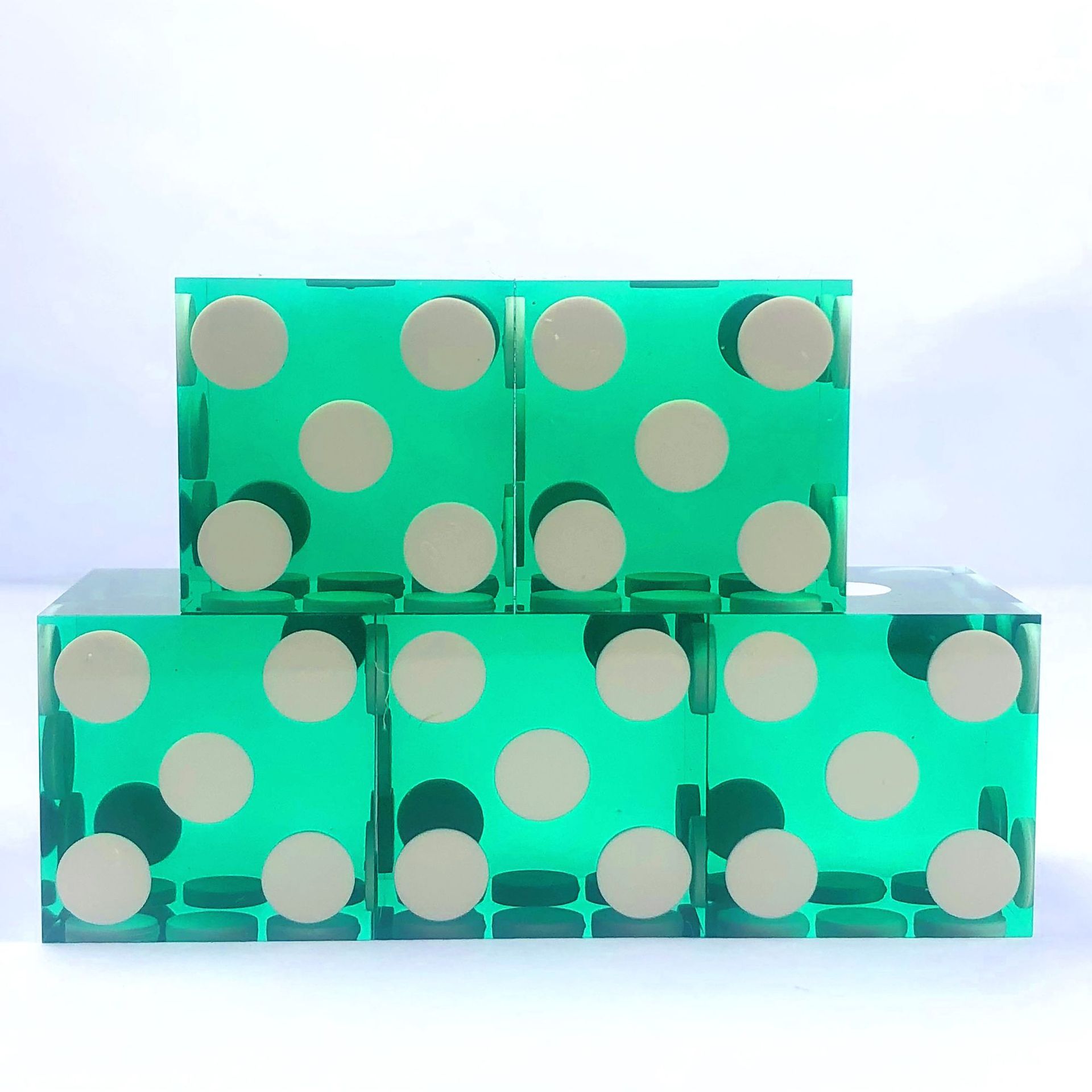 Transparent green and white dots