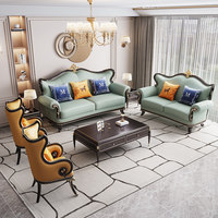 Canapé d'art en cuir véritable de style européen, garni d'éponge, en bois massif, mobile, couleur ébène, ensemble de canapés de luxe haut de gamme pour villa 1+2+3