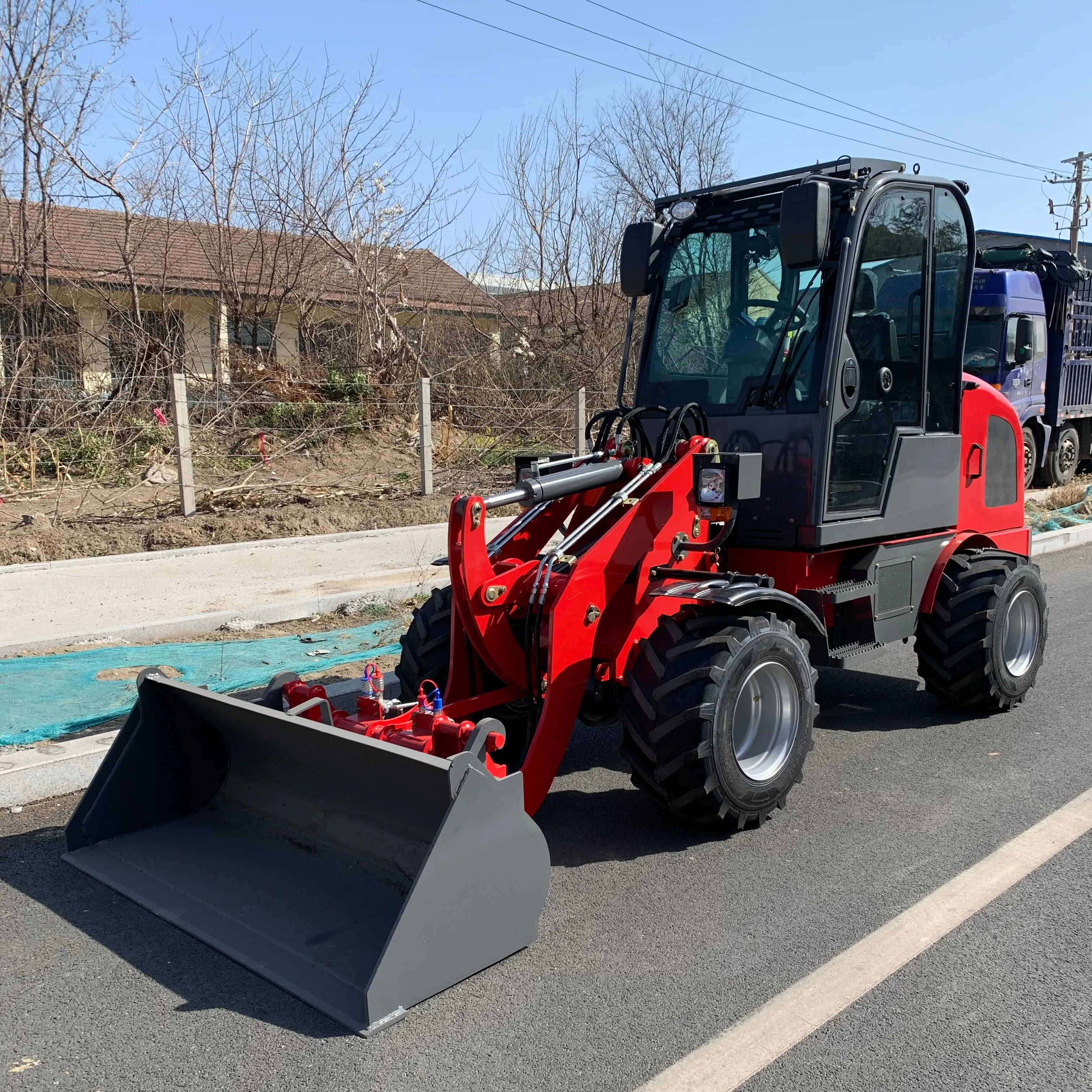 Qingzhou Huizhong Fabrik HZM Wolf 1ton 811 910 hochwertige kleine Radlader Frontlader zu verkaufen