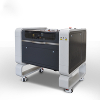 Machine de gravure laser co2 50W 60W 4060 pour couper le verre de caoutchouc de cuir acrylique plastique bois