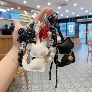 Porte-clés en cuir PU 3D mignons et kawaii, animaux 3D et pompons, accessoires pour clés de voiture avec breloques pour sacs à main - Product Image 2