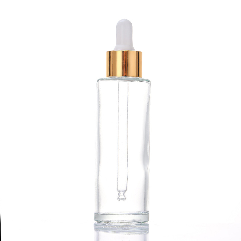 Botella transparente con tapa dorada / tapa blanca