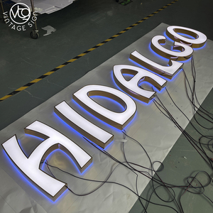 Insegna Luminosa Personalizzata con Lettere Retroilluminate Bianche, Bordo Blu e Grafica a Stella per Negozi e Attività Locali - Product Image 5